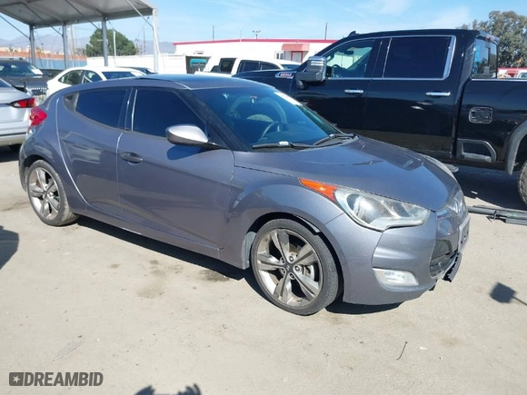 2016 Hyundai Veloster with VIN KMHTC6AD8GU296991, listed as a IAAI auction lot 41720599 with 108,121 mi miles. Bid and sale history available at carsss.com. Image 1.