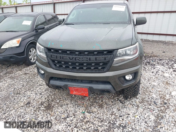 2018 Chevrolet Colorado 4WD LT z VIN 1GCGTCEN2J1235085, wystawiony jako IAAI lot #42192629 z przebiegiem 83 914 mil mil oraz . Historia ofert i sprzedaży dostępna na DreamBid. Obrazek 12.