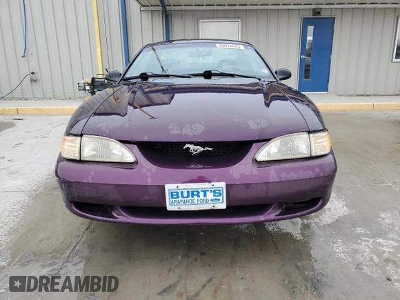 1996 Ford Mustang GT z VIN 1FALP42X8TF196321, wystawiony jako Copart lot #50874885 z przebiegiem 86 945 mil mil oraz Szkoda całkowita • Salvage title. Historia ofert i sprzedaży dostępna na DreamBid. Obrazek 5.