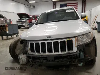 2011 Jeep Grand Cherokee Laredo z VIN 1J4RR4GGXBC609891, wystawiony jako Copart lot #52089645 z przebiegiem 180 895 mil mil oraz Szkoda całkowita • Salvage title. Historia ofert i sprzedaży dostępna na DreamBid. Obrazek 5.