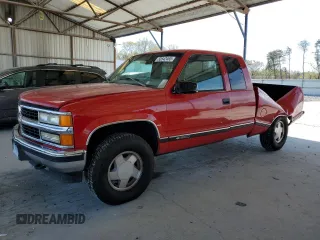1997 Chevrolet Silverado 1500 with VIN 1GCEK19R1VE137711, listed as a Copart auction lot 50542465 with 297,338 mi miles and Salvage Title. Bid and sale history available at DreamBid. Image 1.