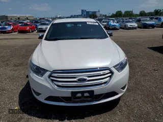 2014 Ford Taurus Limited with VIN 1FAHP2F84EG121559, listed as a Copart auction lot 61764825 with 82,548 mi miles and Salvage title. Bid and sale history available at DreamBid. Image 5.