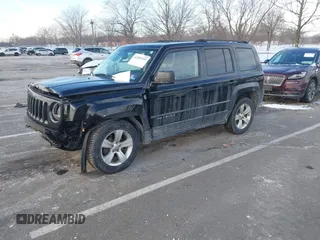 2014 Jeep Patriot Latitude with VIN 1C4NJRFBXED687701, listed as a IAAI auction lot 41399153 with 109,783 mi miles. Bid and sale history available at carsss.com. Image 2.