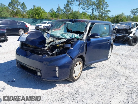 2014 Scion xB with VIN JTLZE4FE8EJ058219, listed as a IAAI auction lot 42049238 with 1 mi miles. Bid and sale history available at carsss.com. Image 2.