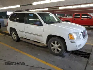 2002 GMC Envoy SLT with VIN 1GKDT13S622231265, listed as a Copart auction lot 45037215 with 213,069 mi miles and Salvage Title. Bid and sale history available at carsss.com. Image 4.
