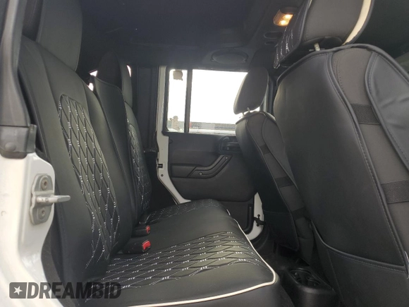2012 Jeep Wrangler Unlimited Sport z VIN 1C4BJWDG9CL169159, wystawiony jako Copart lot #83647894 z przebiegiem 120 684 mil mil oraz Szkoda całkowita • Salvage title. Historia ofert i sprzedaży dostępna na DreamBid. Obrazek 11.