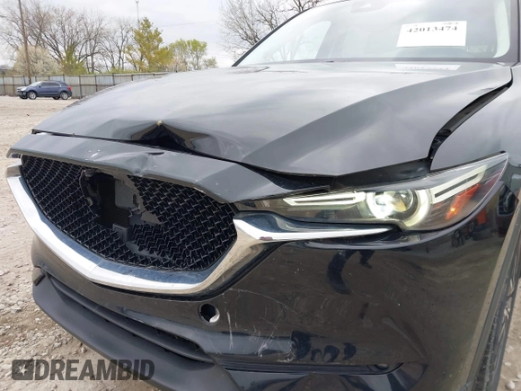 2018 Mazda CX-5 Grand Touring with VIN JM3KFBDM3J0384431, listed as a IAAI auction lot 42013474 with 65,018 mi miles. Bid and sale history available at carsss.com. Image 18.