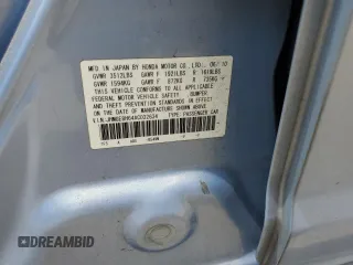 2010 Honda Fit Sport with VIN JHMGE8H64AC032634, listed as a Copart auction lot 61795825 with 143,593 mi miles and Salvage title. Bid and sale history available at DreamBid. Image 13.