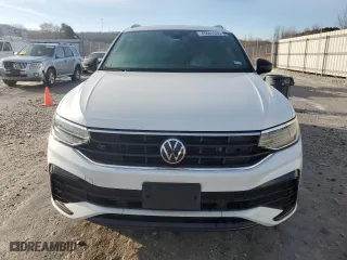 2023 Volkswagen Tiguan SE R-Line Black with VIN 3VVCB7AX8PM121086, listed as a Copart auction lot 45601555 with 27,571 mi miles and Salvage Title. Bid and sale history available at carsss.com. Image 5.