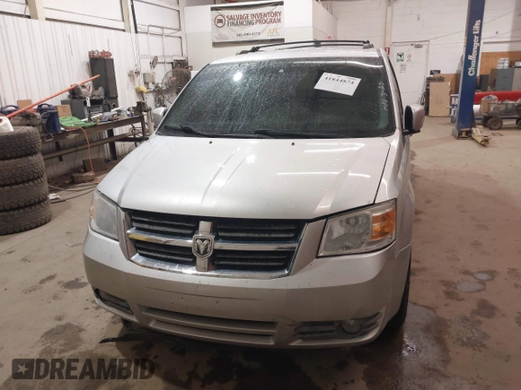 2008 Dodge Grand Caravan SXT with VIN 1D8HN54P18B129536, listed as a IAAI auction lot 41844874 with 260,000 mi miles and . Bid and sale history available at DreamBid. Image 12.