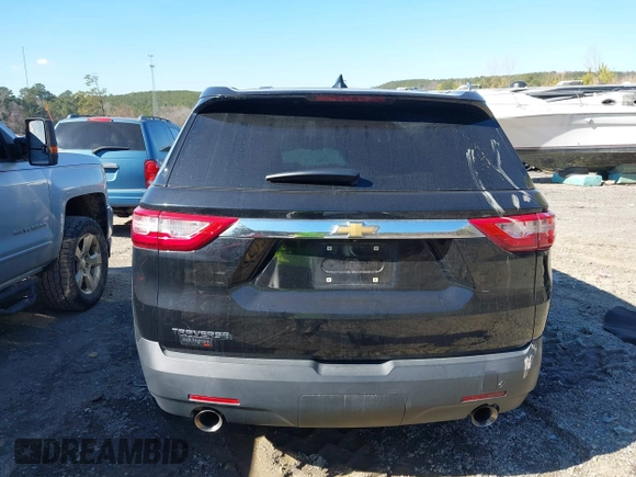 2018 Chevrolet Traverse LS z VIN 1GNERFKW4JJ156173, wystawiony jako IAAI lot #41651724 z przebiegiem 102 041 mil mil oraz . Historia ofert i sprzedaży dostępna na DreamBid. Obrazek 15.
