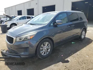 2015 Kia Sedona LX with VIN KNDMB5C1XF6021148, listed as a Copart auction lot 54574715 with 196,086 mi miles and Salvage Title. Bid and sale history available at DreamBid. Image 1.