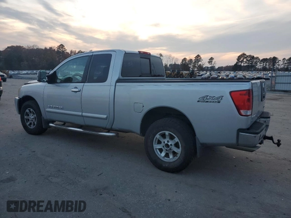 2005 Nissan Titan SE with VIN 1N6BA06B45N539629, listed as a Copart auction lot 82527074 with 154,255 mi miles and Salvage title. Bid and sale history available at DreamBid. Image 2.
