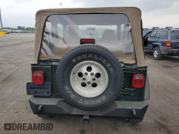 1998 Jeep Wrangler Sahara with VIN 1J4FY49S2WP707318, listed as a Copart auction lot 59508635 with 144,948 mi miles and Clean title. Bid and sale history available at DreamBid. Image 6.