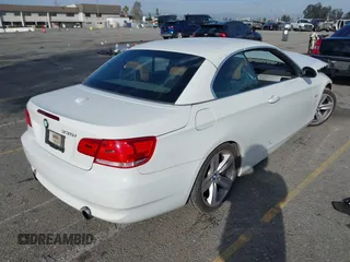 2007 BMW 3 Series 335i with VIN WBAWL73547PX47052, listed as a IAAI auction lot 41700828 with 64,409 mi miles. Bid and sale history available at carsss.com. Image 4.