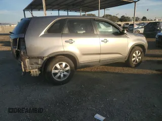 2012 Kia Sorento LX with VIN 5XYKTCA62CG255185, listed as a Copart auction lot 87242304 with 124,224 mi miles and Salvage Title. Bid and sale history available at DreamBid. Image 3.