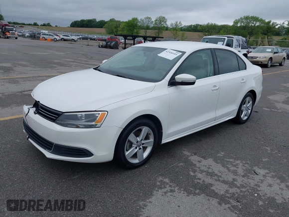 2014 Volkswagen Jetta TDI w/Premium with VIN 3VWLL7AJXEM372547, listed as a IAAI auction lot 42320105 with 113,200 mi miles and . Bid and sale history available at DreamBid. Image 2.