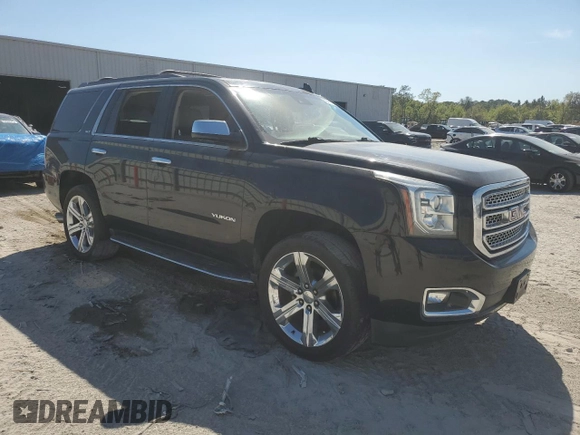 2018 GMC Yukon SLT with VIN 1GKS1BKC9JR108210, listed as a Copart auction lot 50465765 with 106,542 mi miles and Salvage Title. Bid and sale history available at carsss.com. Image 4.