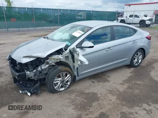 2020 Hyundai Elantra Value Edition z VIN KMHD84LF0LU083231, wystawiony jako IAAI lot #42389540 z przebiegiem 14 338 mil mil oraz . Historia ofert i sprzedaży dostępna na DreamBid. Obrazek 2.