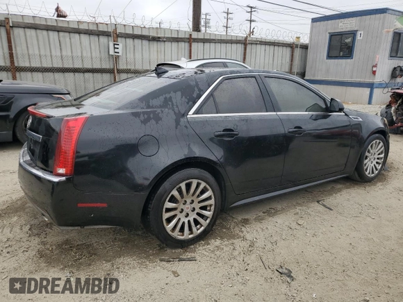 2010 Cadillac CTS z VIN 1G6DK5EG2A0128548, wystawiony jako Copart lot #55623815 z przebiegiem Nie podano mil oraz Szkoda całkowita • Salvage title. Historia ofert i sprzedaży dostępna na DreamBid. Obrazek 3.