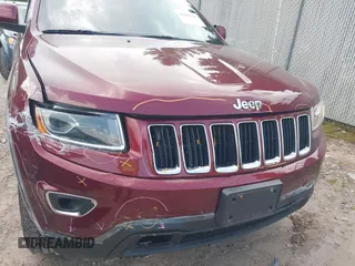 2016 Jeep Grand Cherokee Laredo with VIN 1C4RJFAG8GC318878, listed as a IAAI auction lot 42600747 with 85,882 mi miles and . Bid and sale history available at DreamBid. Image 6.