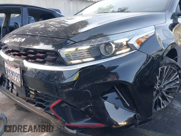2023 Kia Forte GT-Line z VIN 3KPF54AD8PE539617, wystawiony jako IAAI lot #41890617 z przebiegiem 26 855 mil mil oraz . Historia ofert i sprzedaży dostępna na DreamBid. Obrazek 17.
