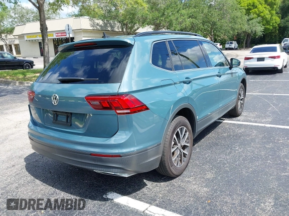 2019 Volkswagen Tiguan SE with VIN 3VV3B7AX8KM171057, listed as a IAAI auction lot 42209509 with 99,437 mi miles and . Bid and sale history available at DreamBid. Image 4.