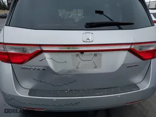 2012 Honda Odyssey Touring with VIN 5FNRL5H99CB055499, listed as a IAAI auction lot 41916534 with 278,435 mi miles. Bid and sale history available at carsss.com. Image 6.