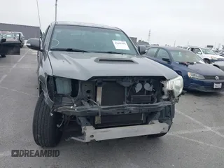 2014 Toyota Tacoma PreRunner with VIN 3TMKU4HN9EM041509, listed as a IAAI auction lot 42441194 with 290,715 mi miles and . Bid and sale history available at DreamBid. Image 13.