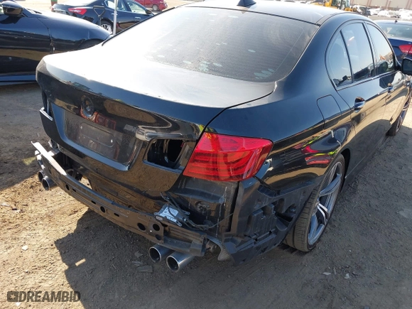 2014 BMW M5 with VIN WBSFV9C56ED097611, listed as a IAAI auction lot 41845196 with 72,215 mi miles. Bid and sale history available at carsss.com. Image 6.