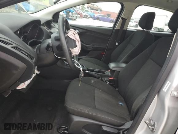 2018 Ford Focus SE with VIN 1FADP3F28JL256318, listed as a Copart auction lot 55524544 with 136,723 mi miles and Salvage title. Bid and sale history available at DreamBid. Image 7.