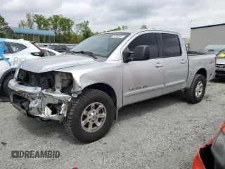 2006 Nissan Titan LE z VIN 1N6BA07B36N568765, wystawiony jako Copart lot #51092085 z przebiegiem 238 826 mil mil oraz Szkody całkowita. Historia ofert i sprzedaży dostępna na DreamBid. Obrazek 1.