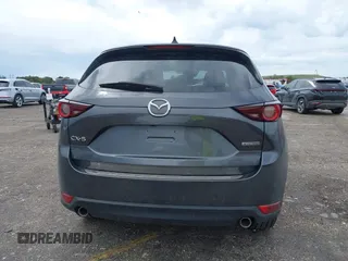 2021 Mazda CX-5 Touring with VIN JM3KFACM1M0461510, listed as a IAAI auction lot 41660439 with 30,352 mi miles. Bid and sale history available at carsss.com. Image 16.