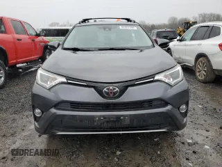 2018 Toyota RAV4 XLE with VIN JTMRFREV0JJ200337, listed as a Copart auction lot 84901594 with 57,301 mi miles and Salvage Title. Bid and sale history available at DreamBid. Image 5.