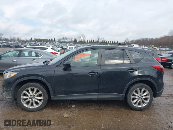 2014 Mazda CX-5 Grand Touring with VIN JM3KE4DY5E0373731, listed as a IAAI auction lot 41517852 with 148,414 mi miles. Bid and sale history available at carsss.com. Image 14.