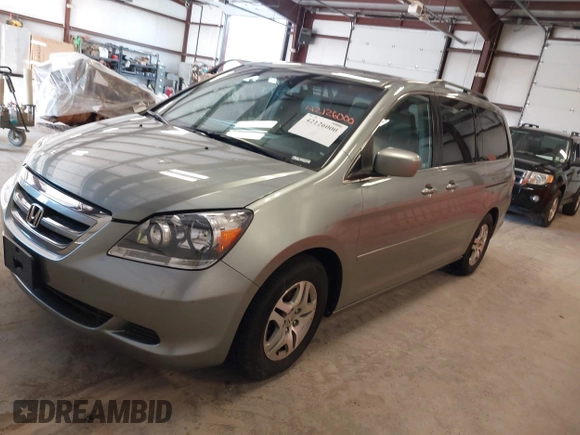 2007 Honda Odyssey EX-L with VIN 5FNRL38737B095747, listed as a IAAI auction lot 42126000 with 178,779 mi miles. Bid and sale history available at carsss.com. Image 2.