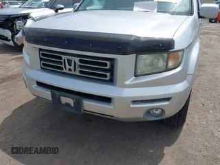 2006 Honda Ridgeline RTL with VIN 2HJYK16566H550339, listed as a IAAI auction lot 42223323 with 240,372 mi miles and . Bid and sale history available at DreamBid. Image 6.