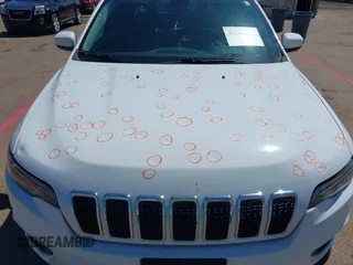 2019 Jeep Cherokee Latitude Plus with VIN 1C4PJMLB8KD112699, listed as a IAAI auction lot 42166892 with 128,396 mi miles and . Bid and sale history available at DreamBid. Image 6.