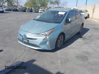 2016 Toyota Prius Four with VIN JTDKARFU8G3510996, listed as a IAAI auction lot 41406304 with 118,526 mi miles and . Bid and sale history available at DreamBid. Image 2.