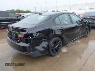 2025 Toyota Camry LE with VIN 4T1DAACKXSU526497, listed as a IAAI auction lot 42211721 with 22,312 mi miles and . Bid and sale history available at DreamBid. Image 4.