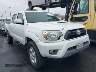 2012 Toyota Tacoma PreRunner with VIN 3TMKU4HN8CM032927, listed as a IAAI auction lot 42188378 with 173,445 mi miles and . Bid and sale history available at DreamBid. Image 1.