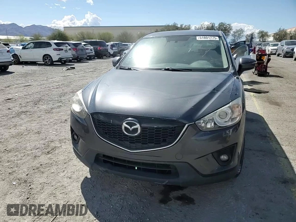 2015 Mazda CX-5 Grand Touring with VIN JM3KE4DY9F0536771, listed as a Copart auction lot 51801775 with 88,529 mi miles and Salvage Title. Bid and sale history available at DreamBid. Image 12.