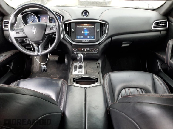 2016 Maserati Ghibli S Q4 z VIN ZAM57RTA6G1172334, wystawiony jako Copart lot #56601575 z przebiegiem 109 524 mil mil oraz Szkody całkowita. Historia ofert i sprzedaży dostępna na DreamBid. Obrazek 8.