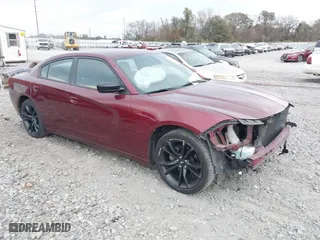 2017 Dodge Charger SE with VIN 2C3CDXBGXHH612156, listed as a IAAI auction lot 41028308 with 123,438 mi miles. Bid and sale history available at carsss.com. Image 1.