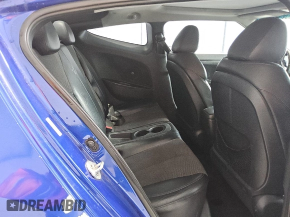 2013 Hyundai Veloster w/Black Int z VIN KMHTC6AD2DU125066, wystawiony jako Copart lot #60921325 z przebiegiem 189 503 mil mil oraz Czysty tytuł • Clean title. Historia ofert i sprzedaży dostępna na DreamBid. Obrazek 10.