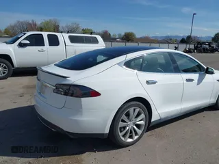 2014 Tesla Model S P85D with VIN 5YJSA1H20EFP63761, listed as a IAAI auction lot 41980472 with 109,164 mi miles and . Bid and sale history available at DreamBid. Image 4.