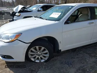 2014 Chrysler 200 Limited with VIN 1C3CCBCG2EN135312, listed as a IAAI auction lot 41787181 with 129,688 mi miles. Bid and sale history available at carsss.com. Image 6.