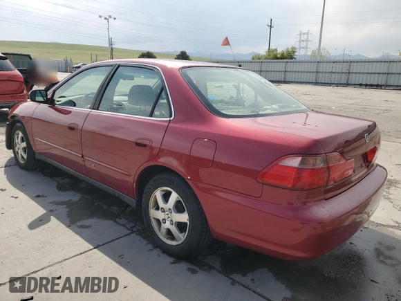 2000 Honda Accord SE with VIN JHMCG5677YC016067, listed as a Copart auction lot 54243735 with 155,183 mi miles and Salvage title. Bid and sale history available at DreamBid. Image 2.