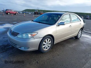 2004 Toyota Camry LE with VIN 4T1BF30K24U577908, listed as a IAAI auction lot 41591147 with 151,678 mi miles and . Bid and sale history available at DreamBid. Image 18.