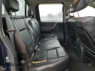 2011 Nissan Titan Pro-4X z VIN 1N6BA0EC0BN322228, wystawiony jako Copart lot #47617305 z przebiegiem 189 151 mil mil oraz Szkoda całkowita • Salvage title. Historia ofert i sprzedaży dostępna na DreamBid. Obrazek 10.